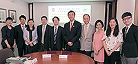 Delegates from Zhejiang University pose for a group photo with members of CUHK